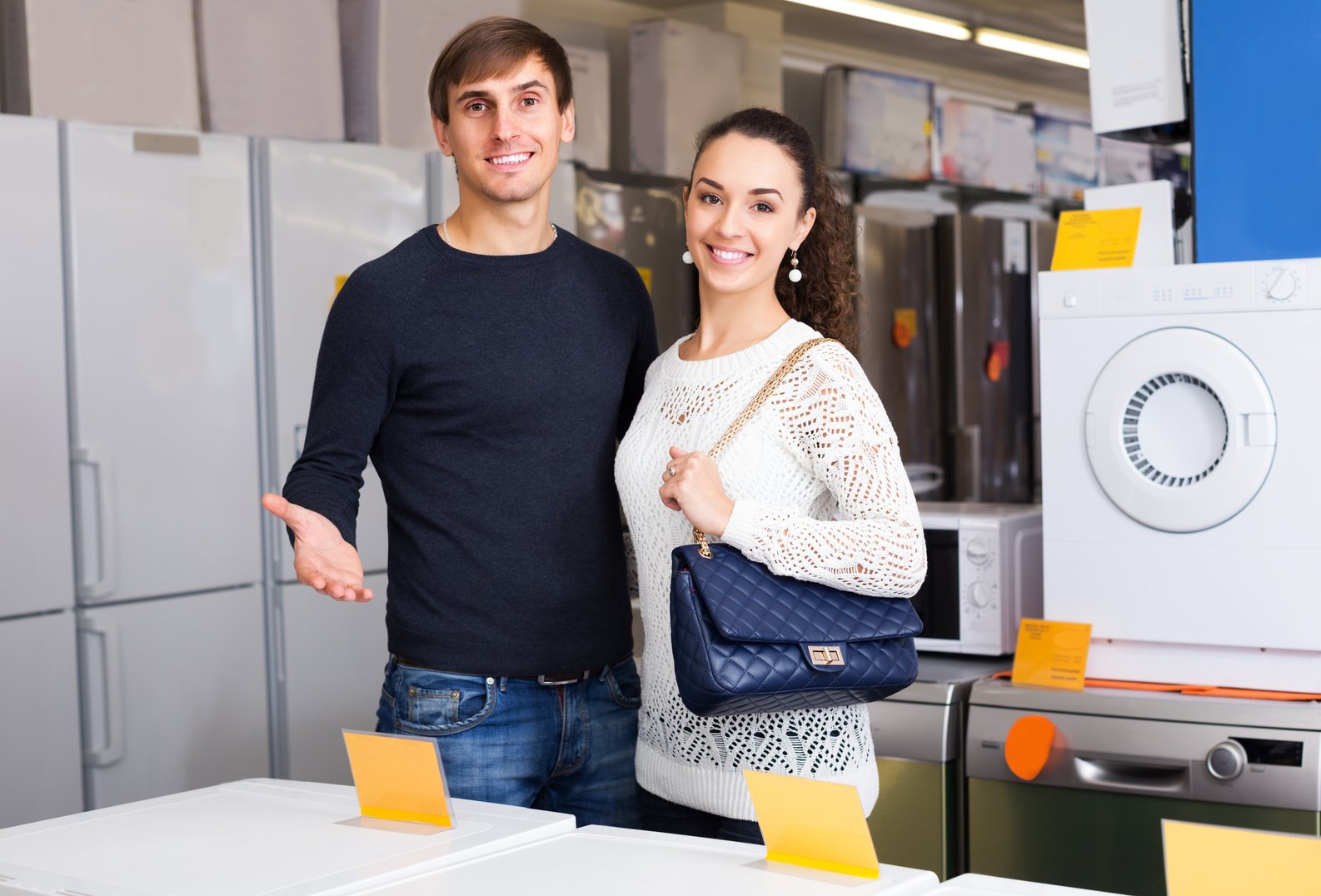 Couple at household appliances store